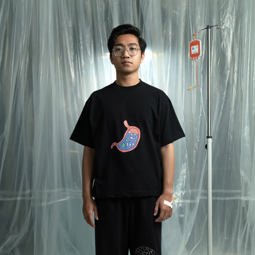 PEANUT STAIN - Internal conflict stomach black oversized tshirt